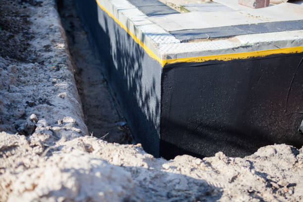 Professional Waterproofing technician working in Harrietta, MI